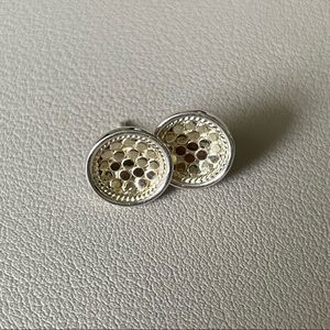 Anna Beck: Classic disk stud earrings. Silver and gold tones